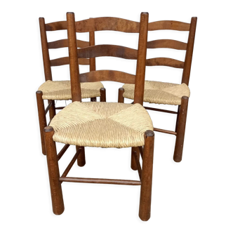 Brutalist chairs in walnut and straw