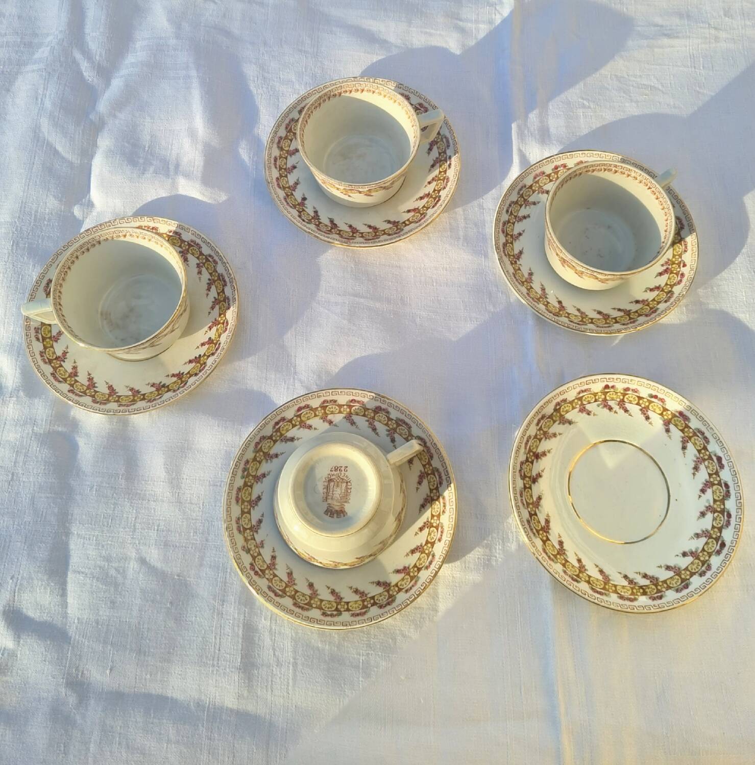 Gien opaque porcelain cups from the early 20th century