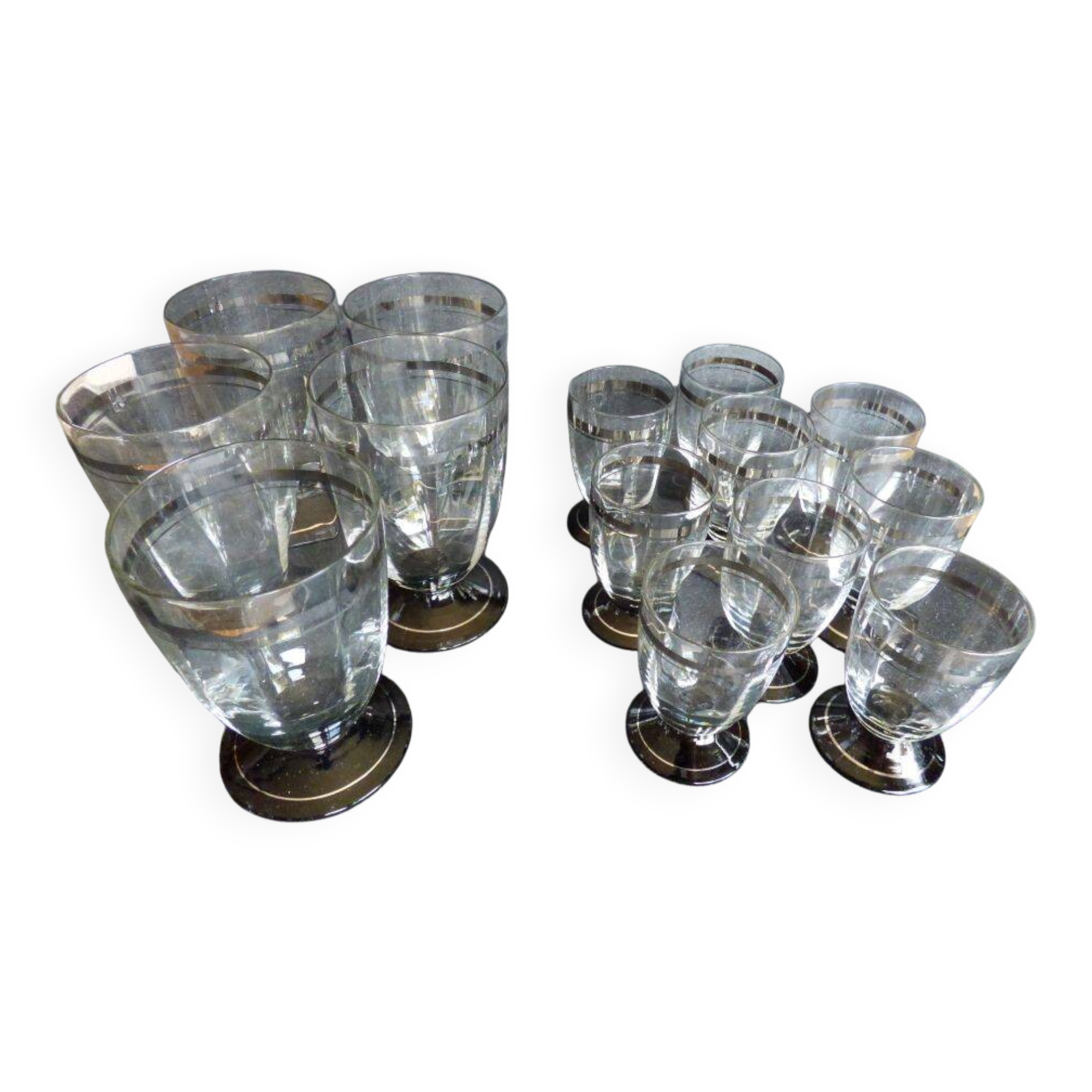 2 series of vintage glasses with black stems from the 1930s.