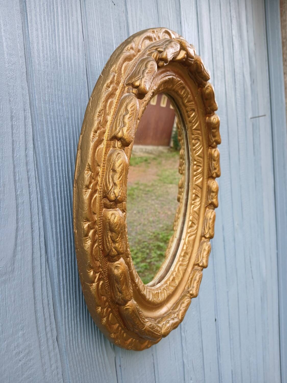 Miroir ancien en bois doré