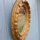 Miroir ancien en bois doré