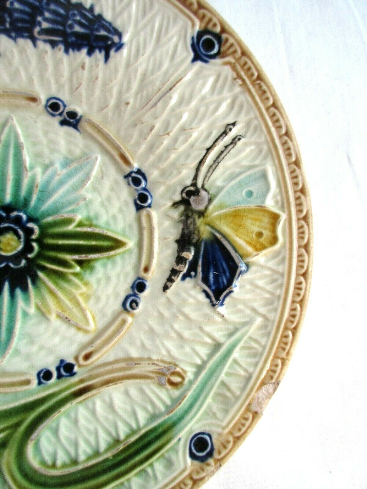 Art Deco dabbling plate, muscaris and a butterfly.