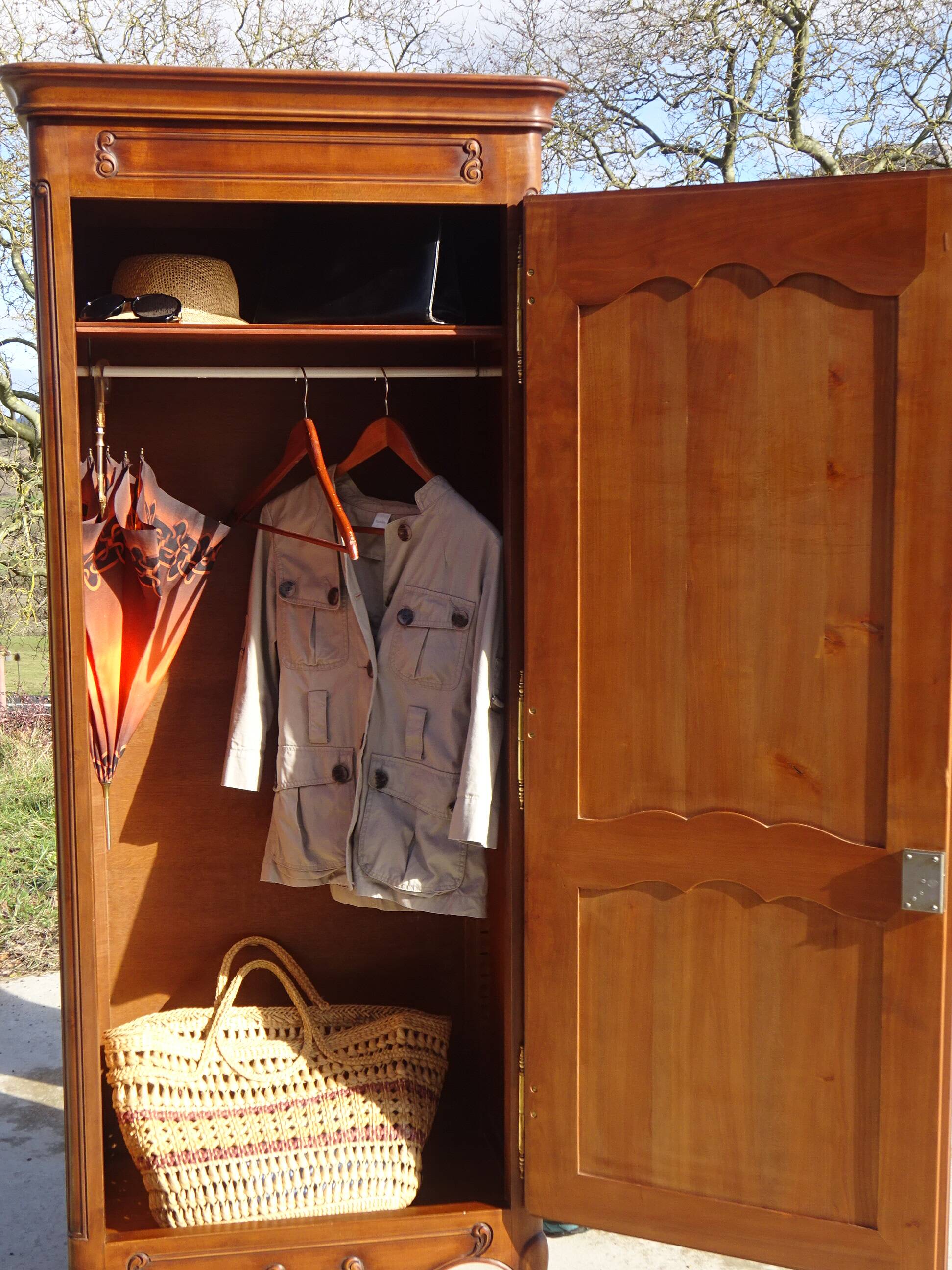 Louis XV style bonnetière in solid cherry wood