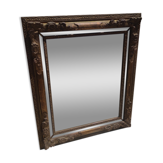 Mirror with wooden parecloses and gilded stucco in regency style