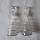 Set of two oil and vinegar glass cruets.