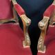Pair of flat-back armchairs in Louis XV style in red velvet.