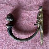 Pair of bronze coats