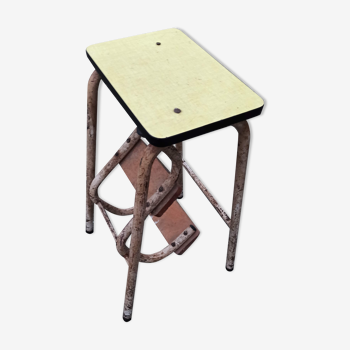 Yellow formica stool stepladder step