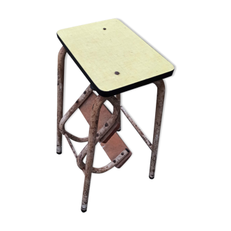 Yellow formica stool stepladder step