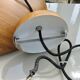 Scandinavian metal pendant light with a faux wood finish, 1980s.
