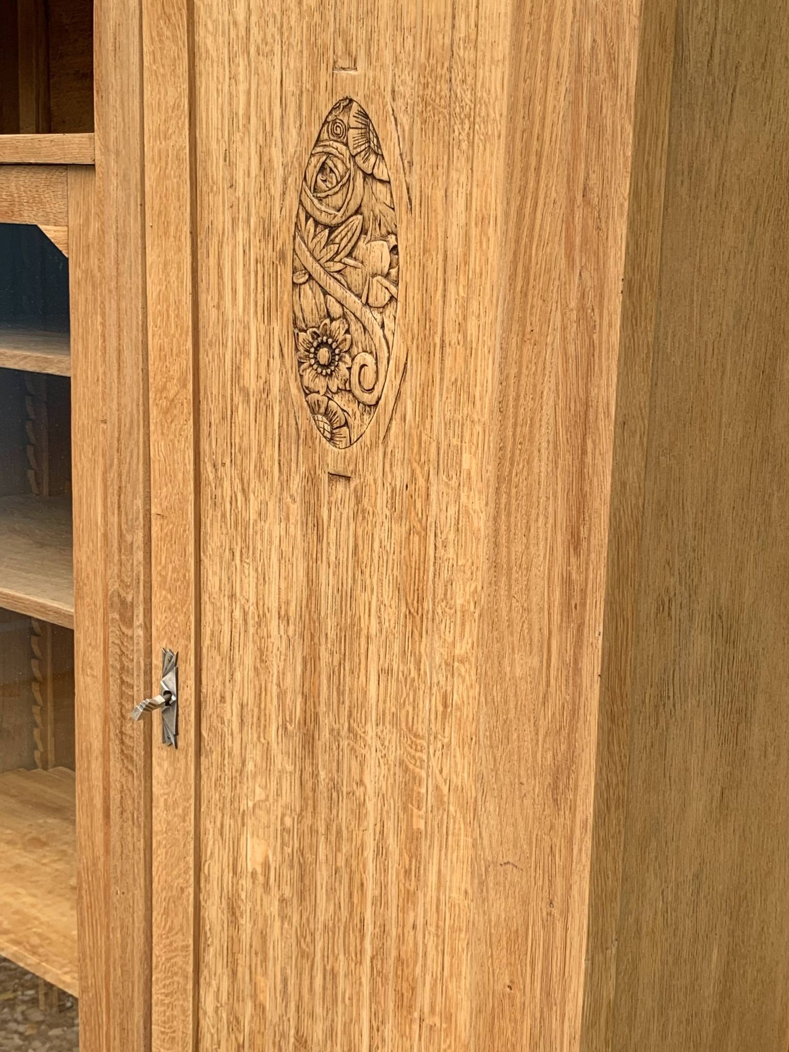 Asymmetrical Art Deco glass-fronted Parisian wardrobe in raw oak, 1930.