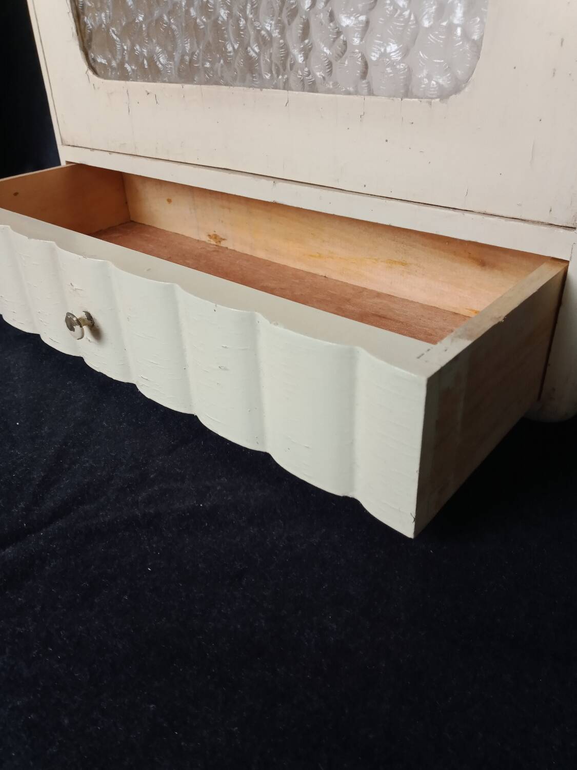 Old wall cabinet with one door and one drawer