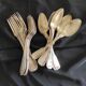 9 antique forks and 9 spoons grade 84 with classic décor
