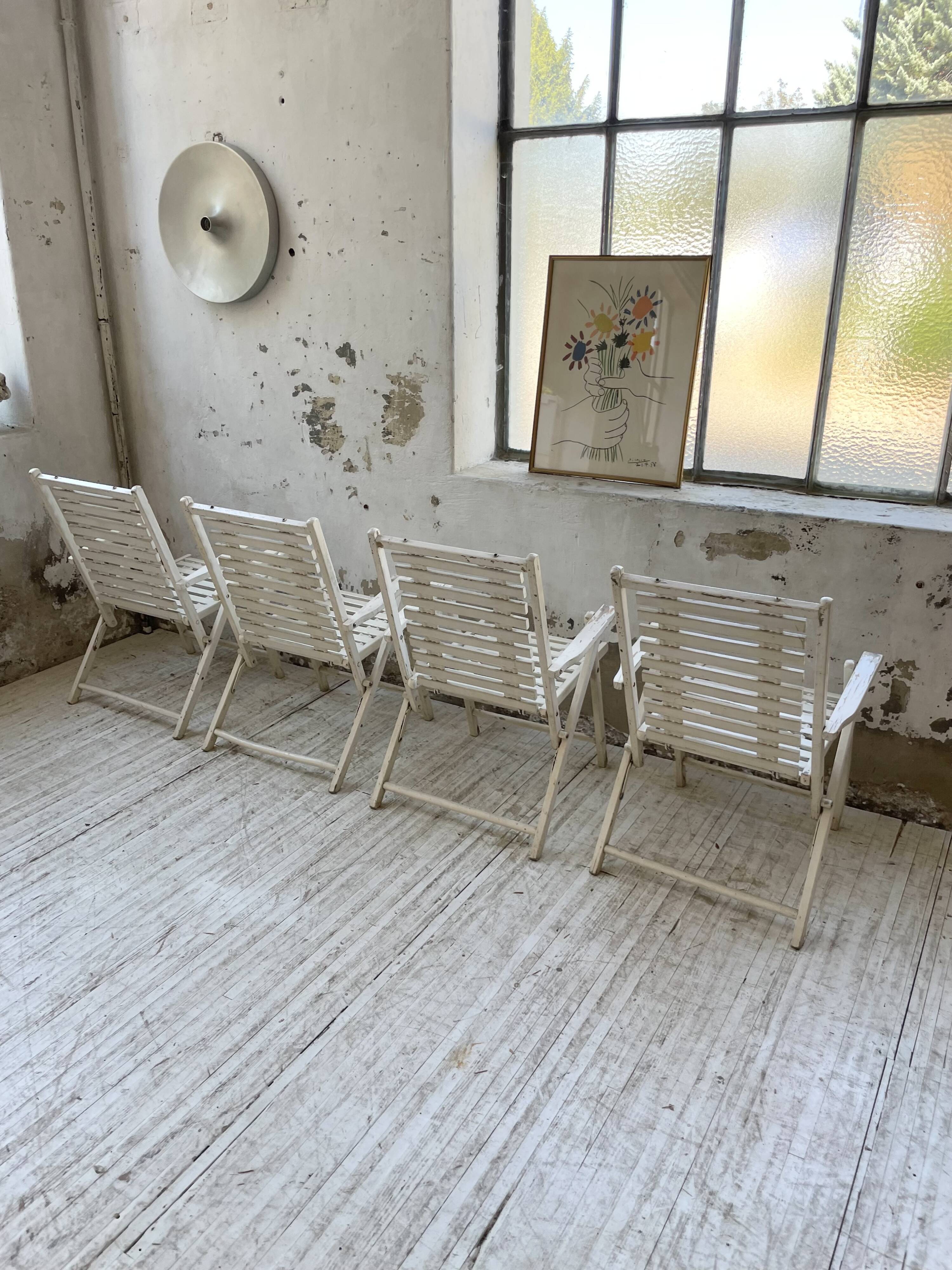 4 white wooden garden chairs