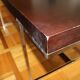 B&B Italia Maxalto - Athos table in wenge, chrome legs - design by Paola Piva.