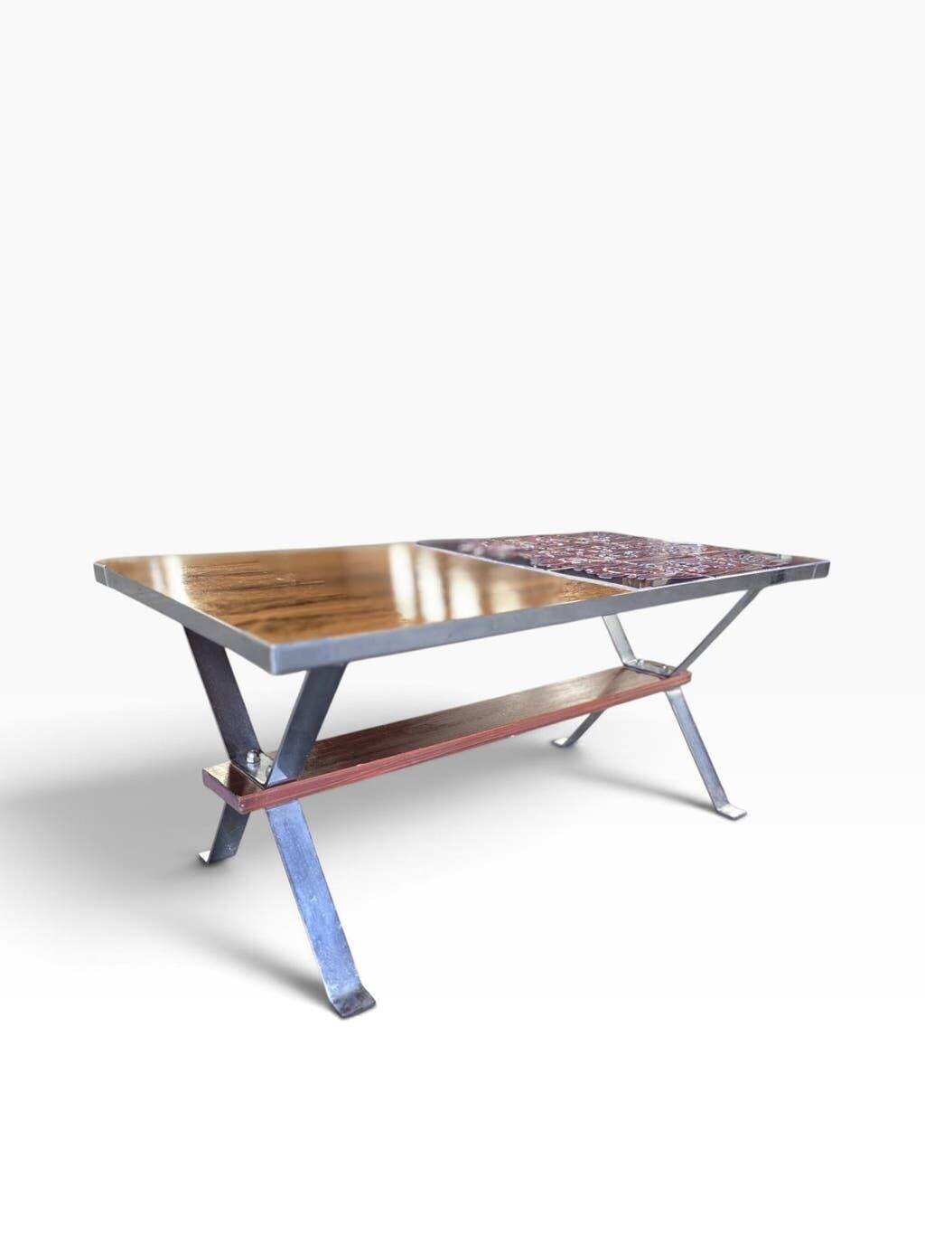 Vintage chrome coffee table with ceramic accent.