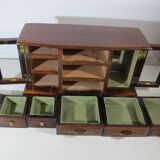 Wooden jewelry box in the shape of a dresser