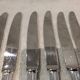 12 silver-plated table knives by Ercuis Valencay, 25cm