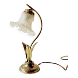 Old brass accent lamp in the shape of a flower