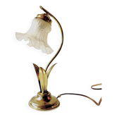 Old brass accent lamp in the shape of a flower