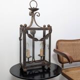 Wrought iron lantern with glass panels, leaf motifs