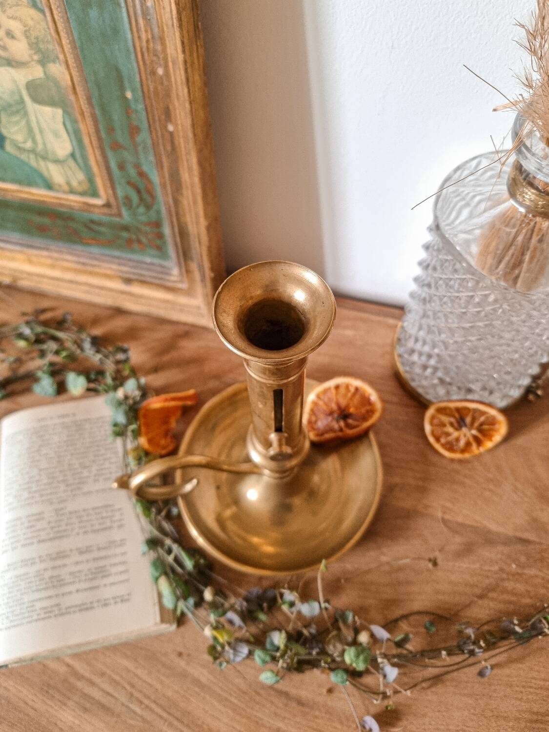 Cellar rat candle holder with brass pusher