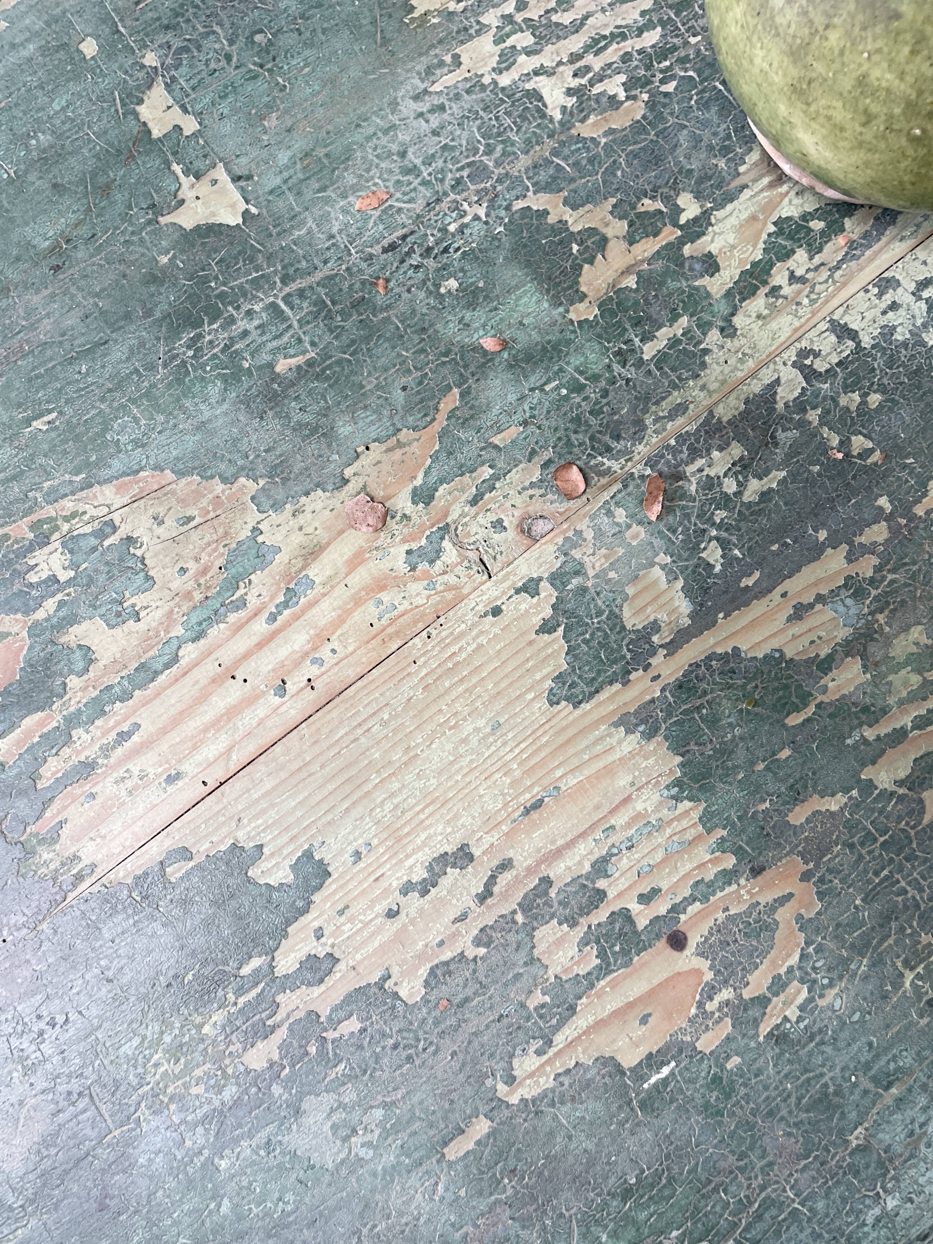 Vintage farm table with spindle legs.