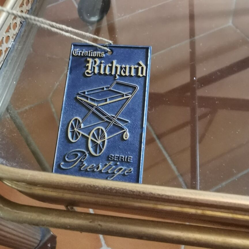 Golden metal serving trolley