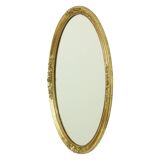Miroir ovale doré Deknudt style Hollywood Regency