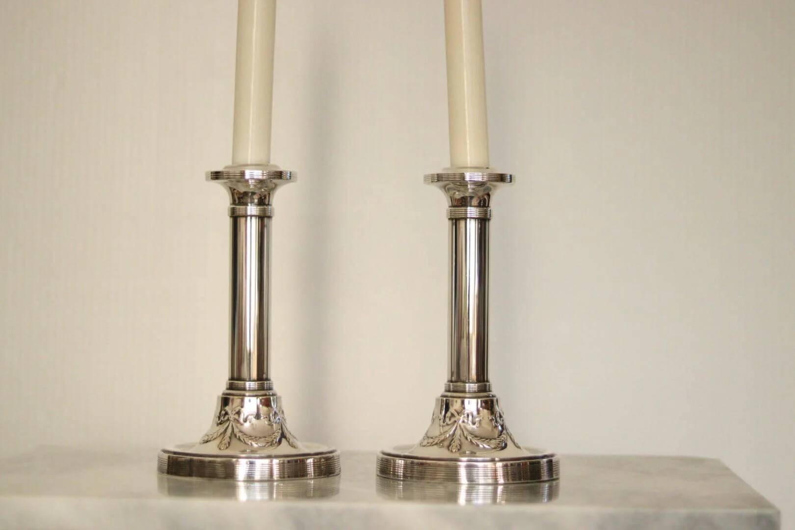 Pair of mid-century silver-plated metal candleholders