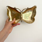 Empty butterfly brass pocket
