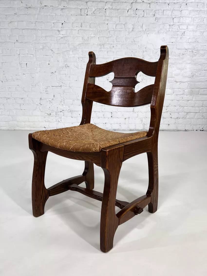 Set of 4 1950s chairs in oak with woven seats.