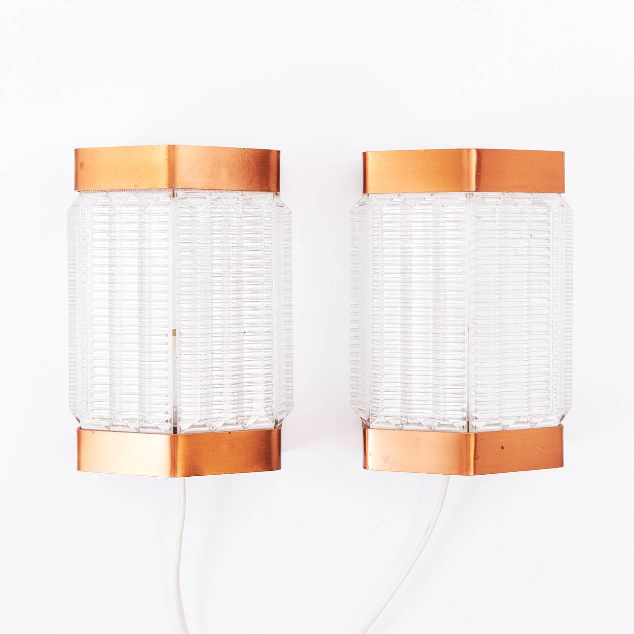 Scandinavian wall lights in copper and pressed glass