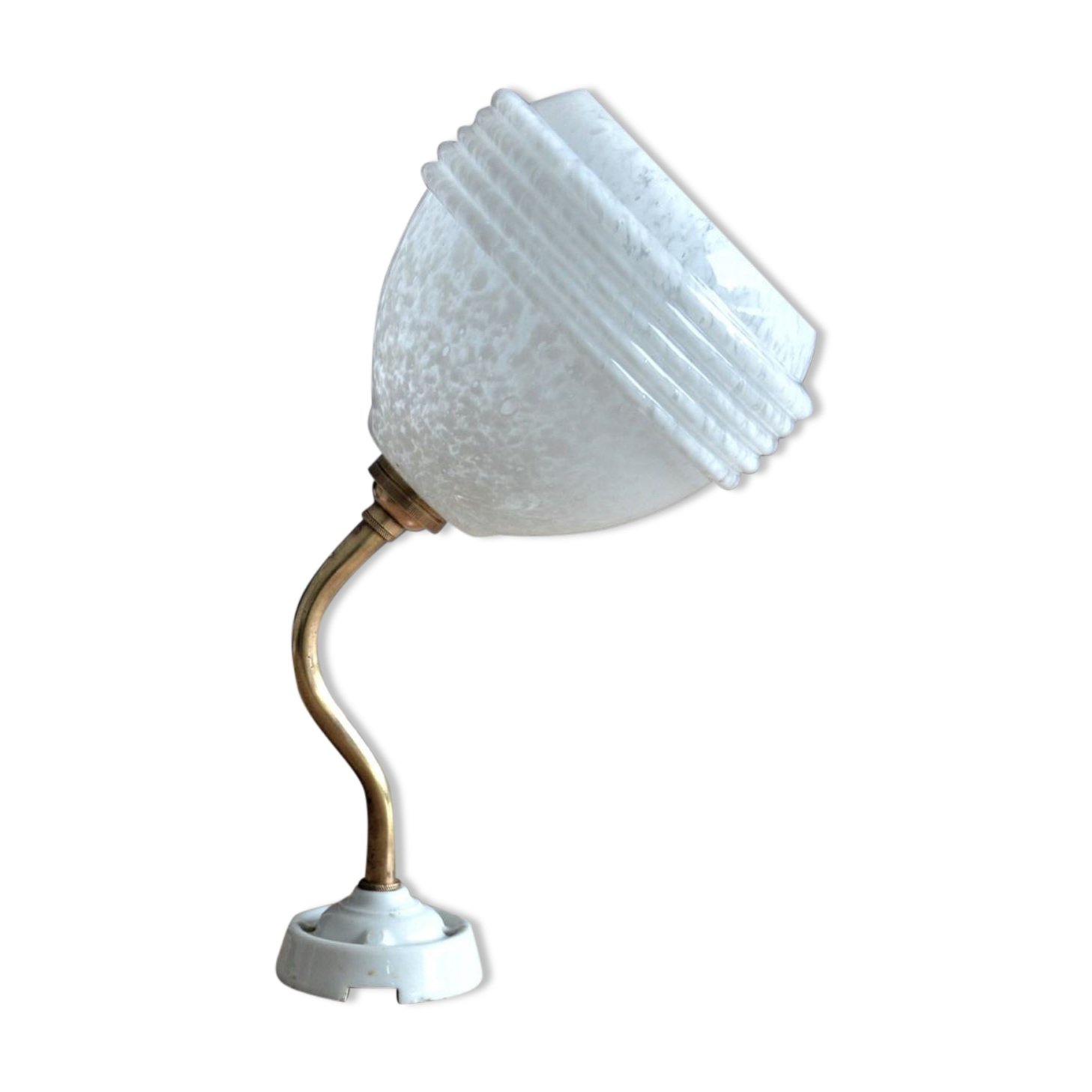 White Clichy glass globe wall light, porcelain support and gooseneck stem in brass