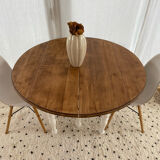 Extendable round table in raw and white wood