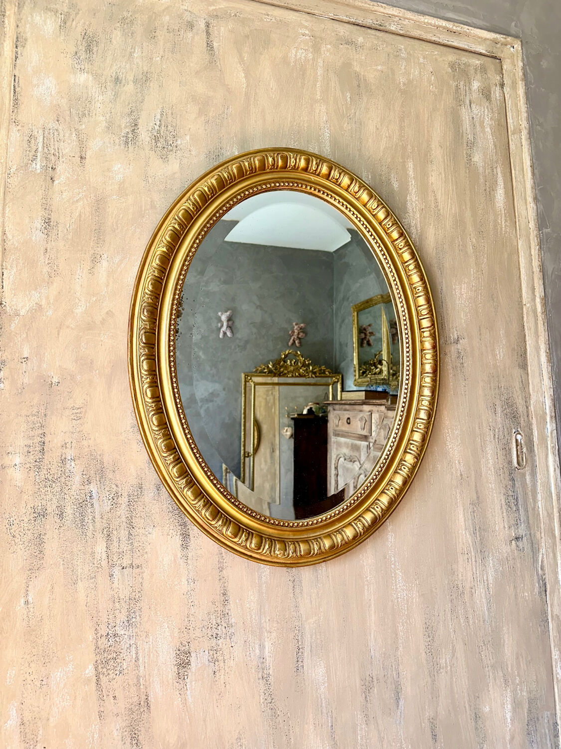 Old oval mirror late nineteenth
