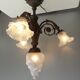 Art nouveau chandelier in bronze and pressed glass 1920