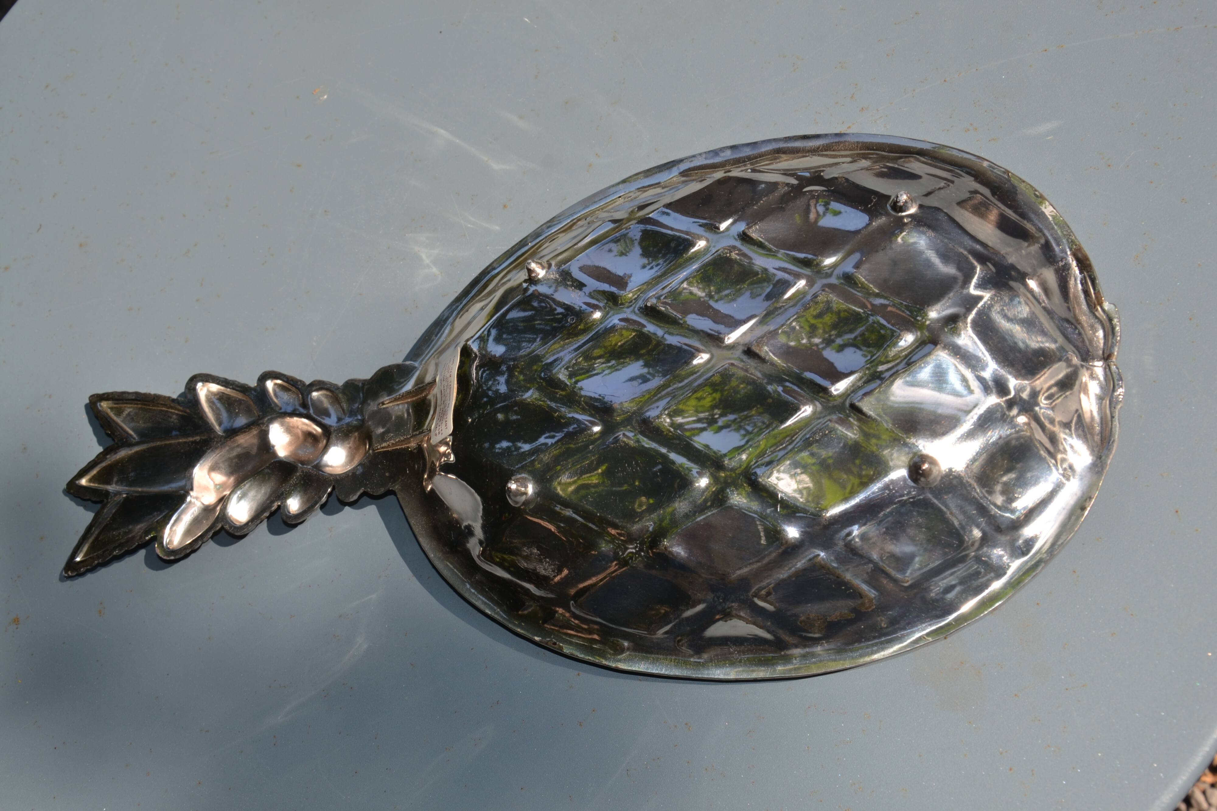 Silver-plated pineapple pocket emptier