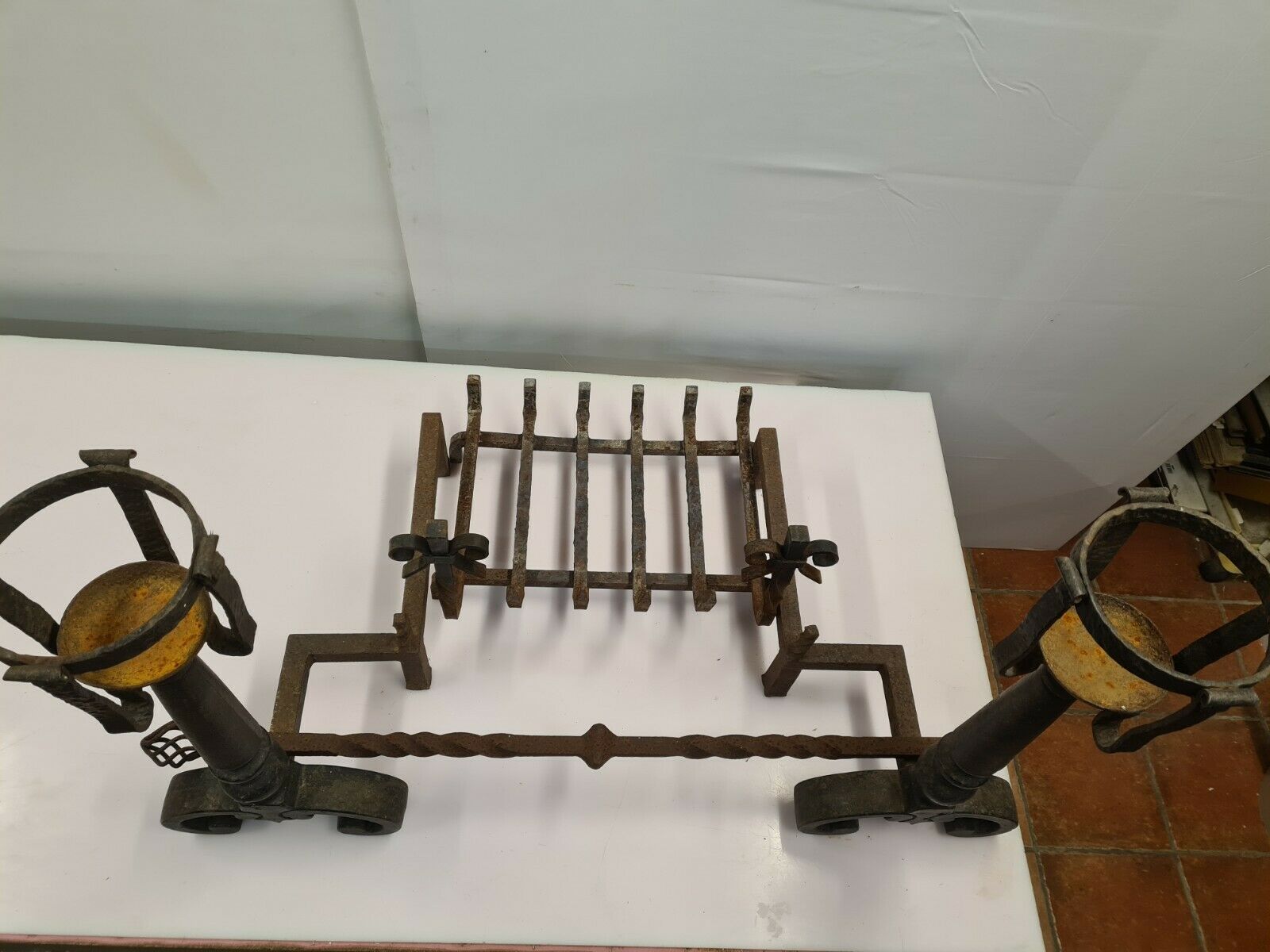 Pair of cast iron andirons for the fireplace