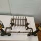 Pair of cast iron andirons for the fireplace