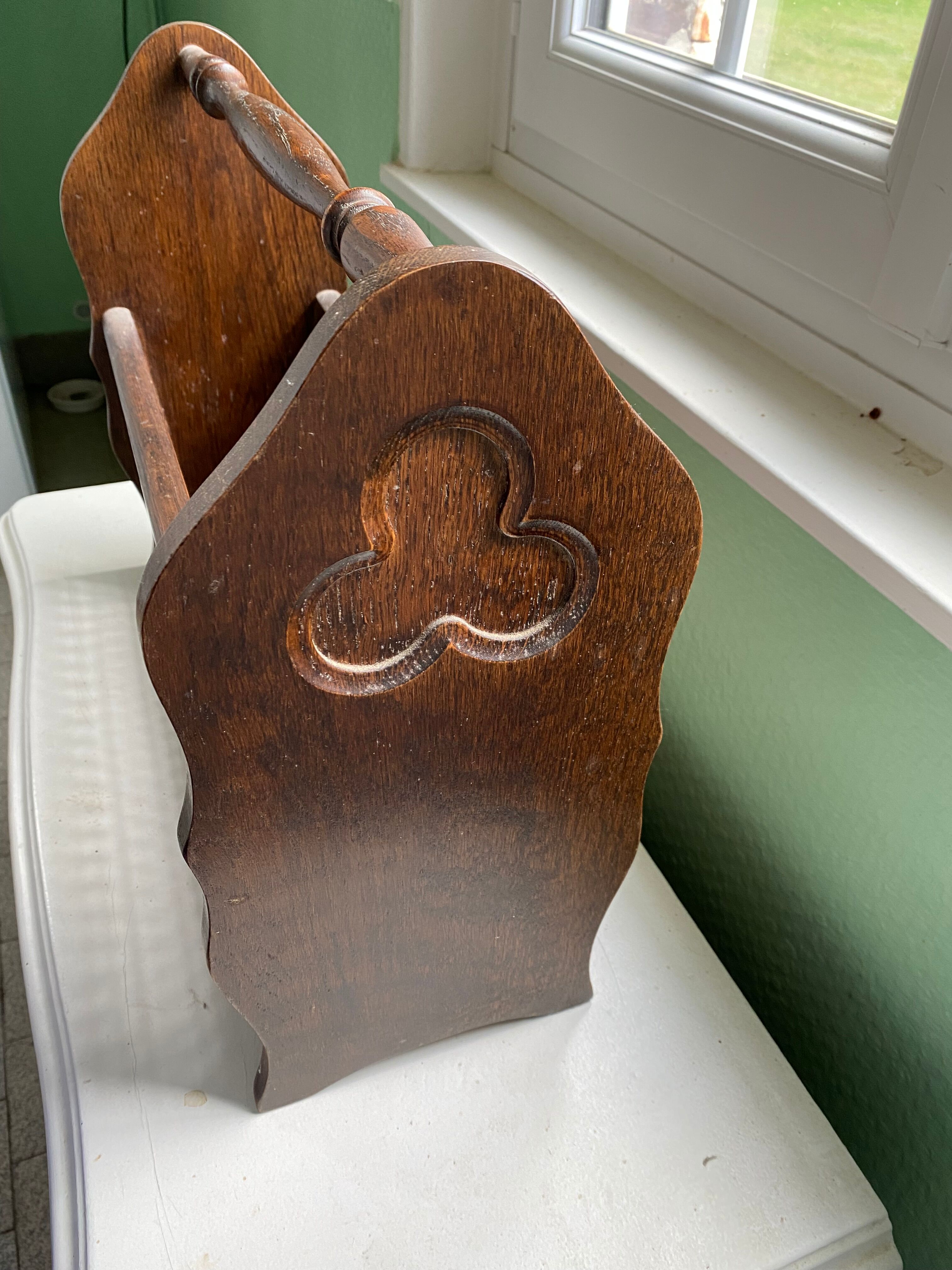 Wooden and cane newspaper rack