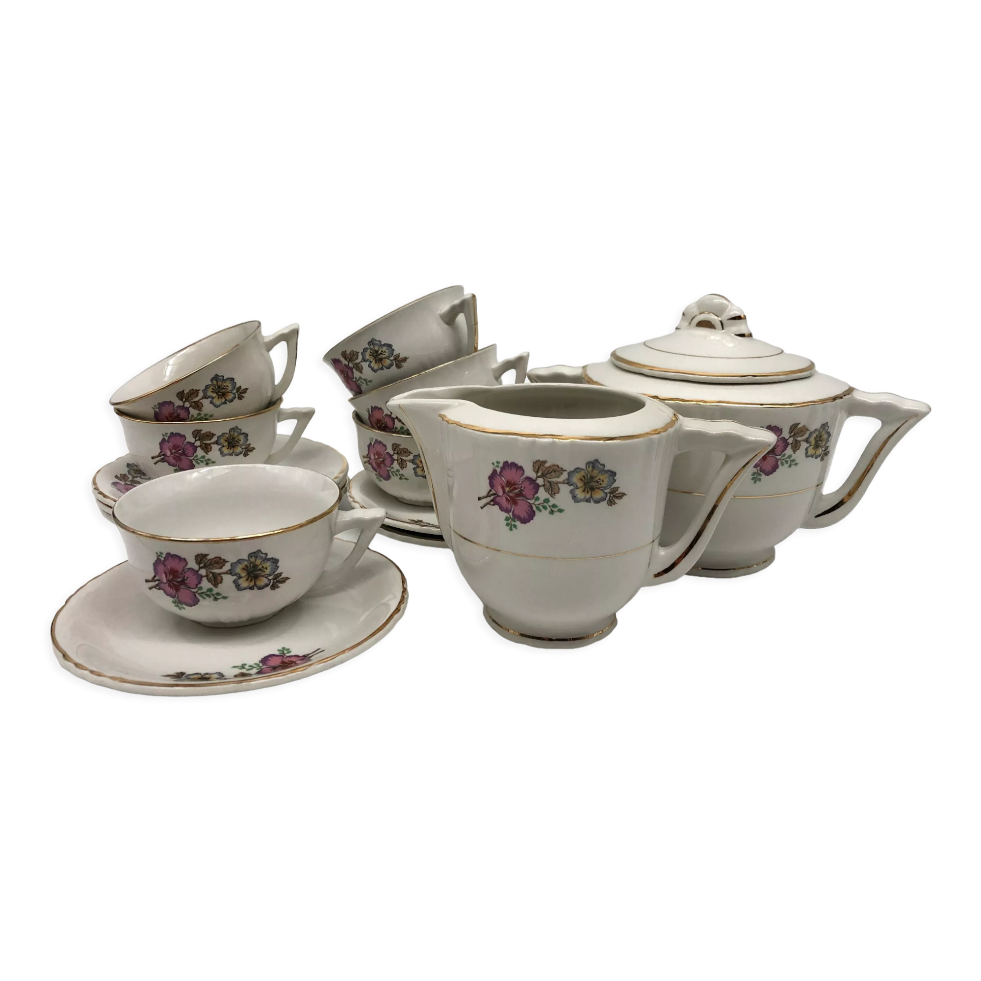 Coffee service 6 cups with saucers, sugar bowl and creamer.