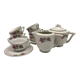 Coffee service 6 cups with saucers, sugar bowl and creamer.