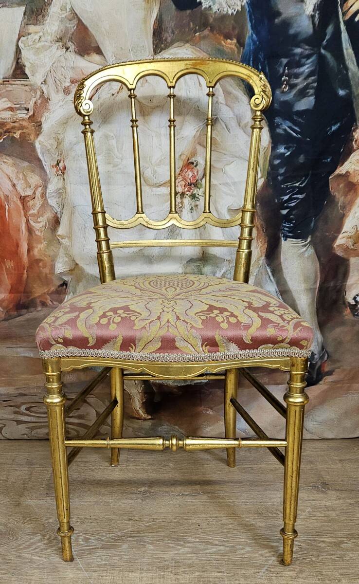 Napoleon III theatre chair in gilded wood