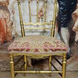 Napoleon III theatre chair in gilded wood
