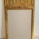 Gilded trumeau in the Louis XVI style with curious decorations.