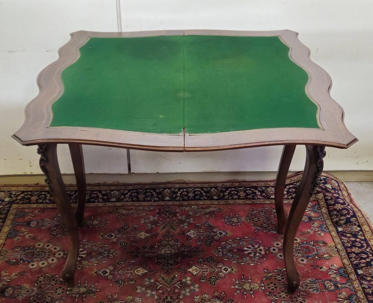 Louis XV style game table in marquetry and mahogany.