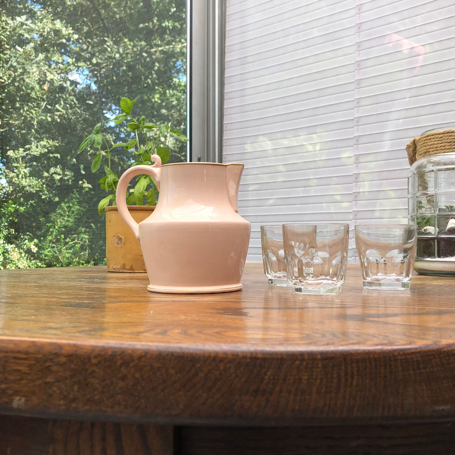 Antique pitcher in pink ceramic
