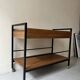 Rolling serving table in wood and black metal by Pierre Guariche for Meurop, design 1960