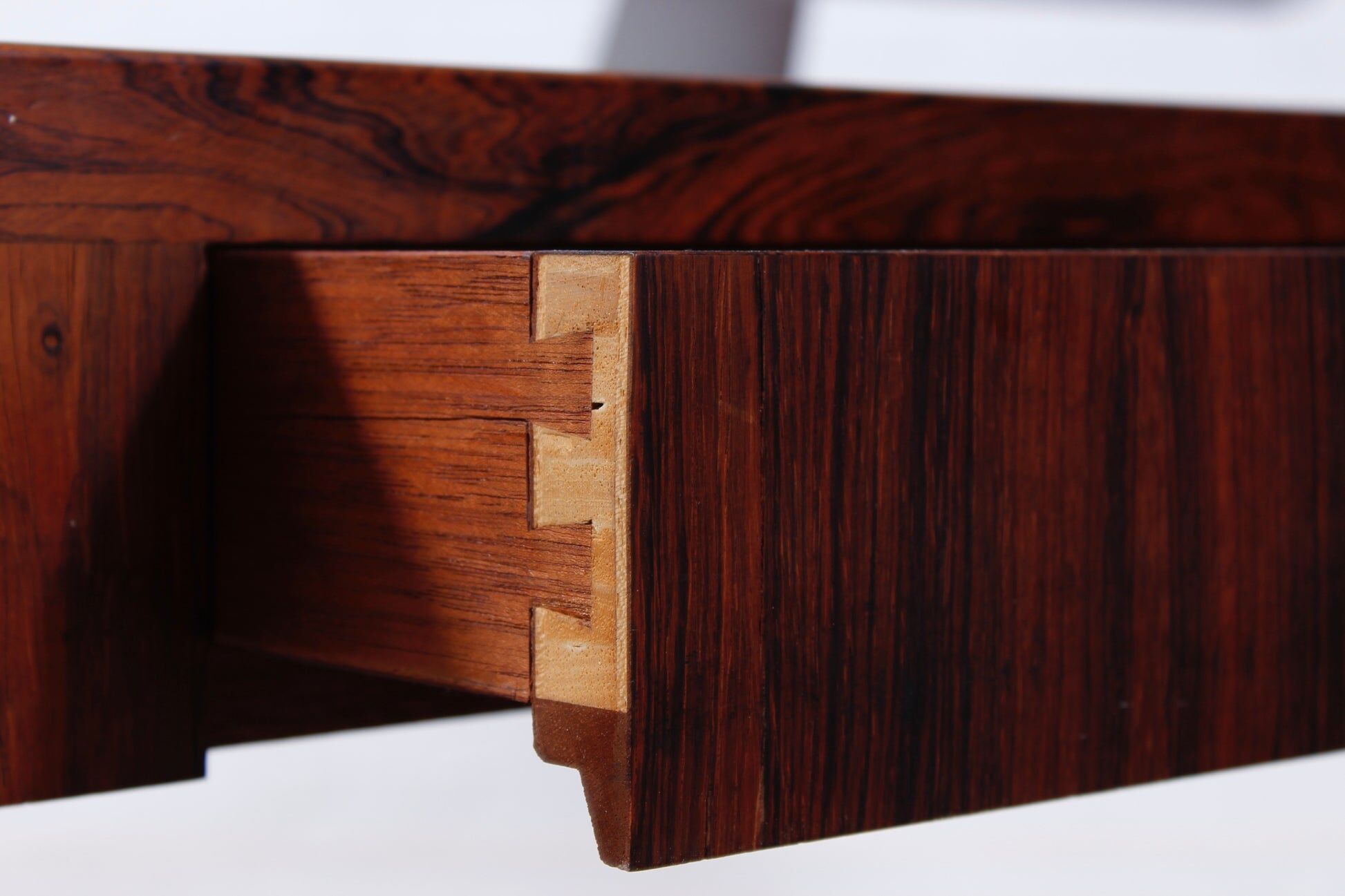 Minimalist rosewood desk by Riis Andersen